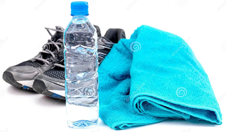 Image of shoes, waterbottle, and a towel
